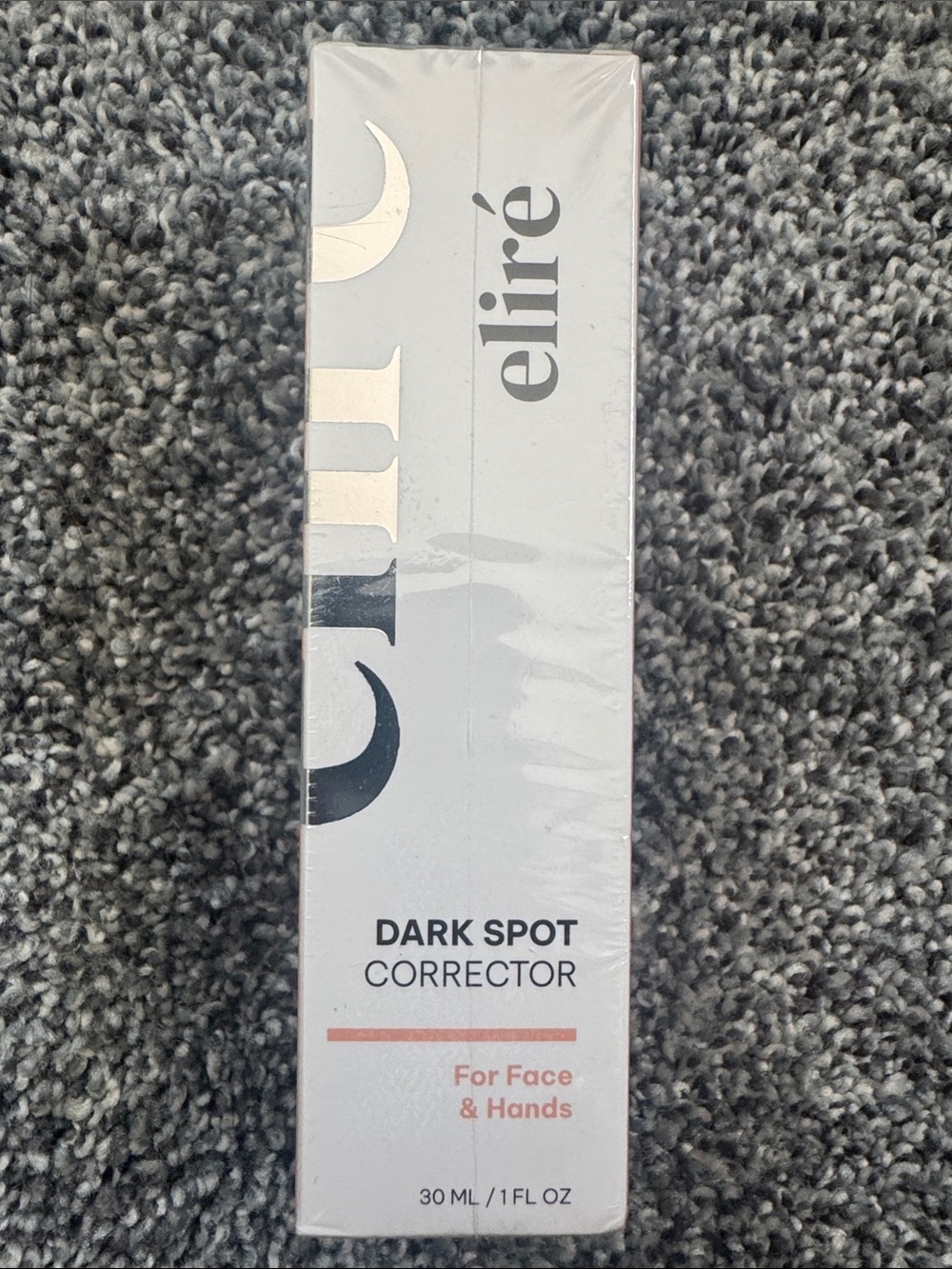 elire Dark Spot Corrector - White & Coral Packaging